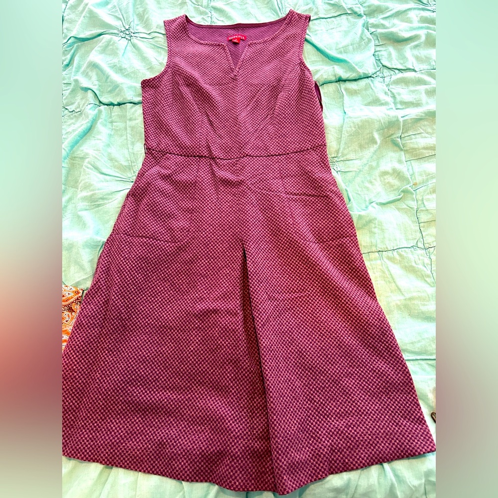 Purple dress. Sleeveless with mid pleat.